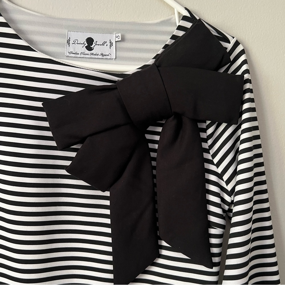 Dainty Jewell’s Black and White Striped Bow Midi Dress